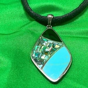 Elegant Silver and Turquoise Pendant Necklace